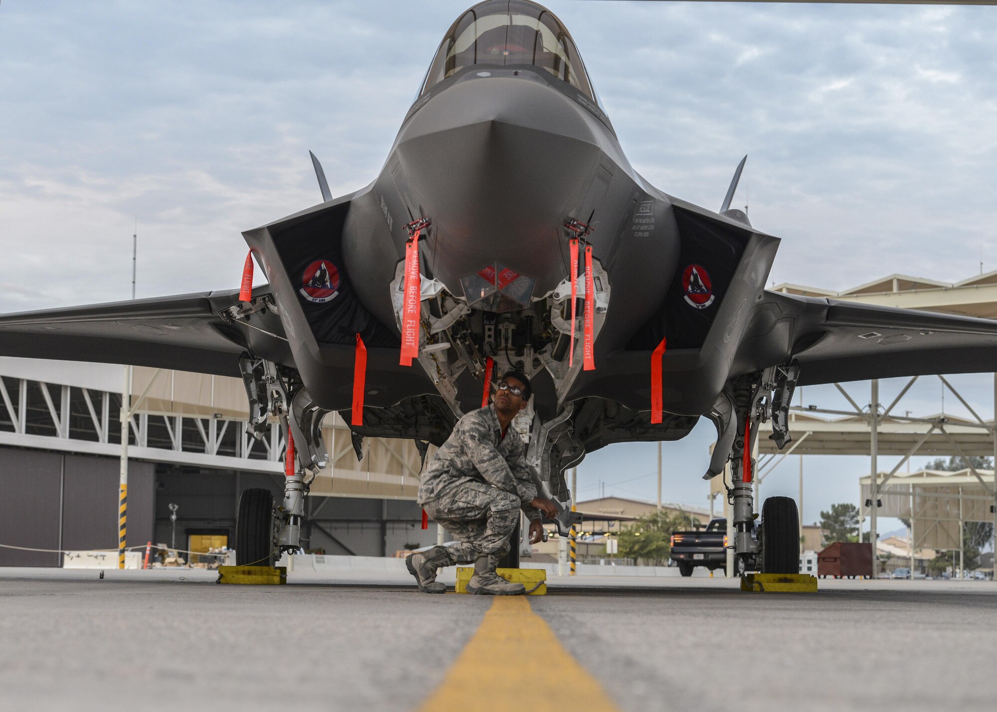Airman 1st Class Eric Ruiz-Garcia, 63rd Aircraft Maintenance Unit crew chief, performs an inspection on an F-35A Lightning II at Luke Air Force Base, Ariz., Dec. 1, 2017. The unit is the first Luke F-35 AMU to receive a 3F, or full-up, combat aircraft capable of pulling 9G’s in the air. (U.S. Air Force photo/Airman 1st Class Caleb Worpel)