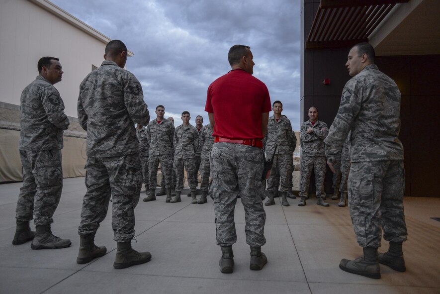 Airmen assigned the 63rd Aircraft Maintenance Unit stand in formation for roll call at Luke Air Force Base, Ariz., Dec. 1, 2017. Currently, 146 personnel are assigned to the unit with the number expected to grow to over 200 in the near future. (U.S. Air Force photo/Airman 1st Class Caleb Worpel)