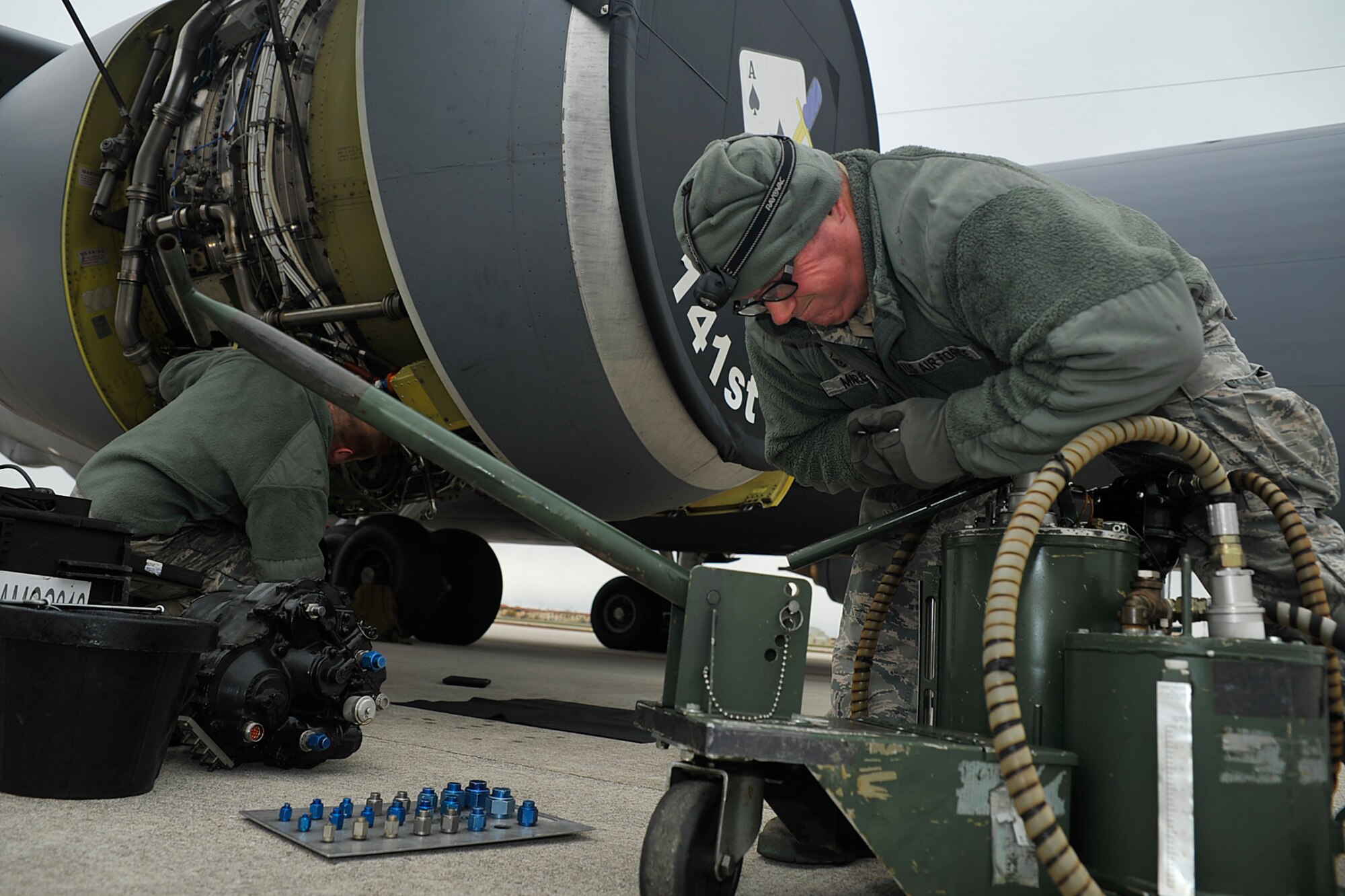 Master Sgt. Carter Marcy, 141st Maintenance Squadron aerospace propulsion specialist, performs maintenance on a KC-135 Stratotanker Nov., 13, 2017, at Aviano Air Base, Italy. Airmen from the 141st Air Refueling Wing trained with F-16 Fighting Falcons from the 31st Fighter Wing on aerial refueling operations. (Washington Air National Guard photo by Tech. Sgt. Tim Chacon)