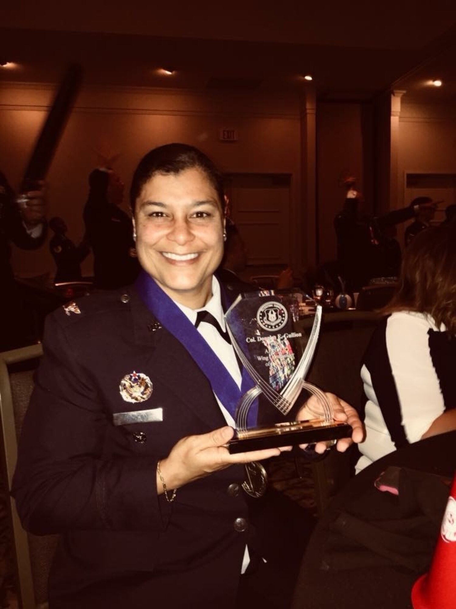 Col. Dana Nelson, 507th Air Refueling Wing vice commander, accepts the award for Commander of the Year from the Central Recruiting Squadron on behalf of Col. Douglas Gullion, 507th ARW commander Nov. 9, 2017 in Orlando, Fla. (U.S. Air Force photo/Master Sgt. Cody Newsom)