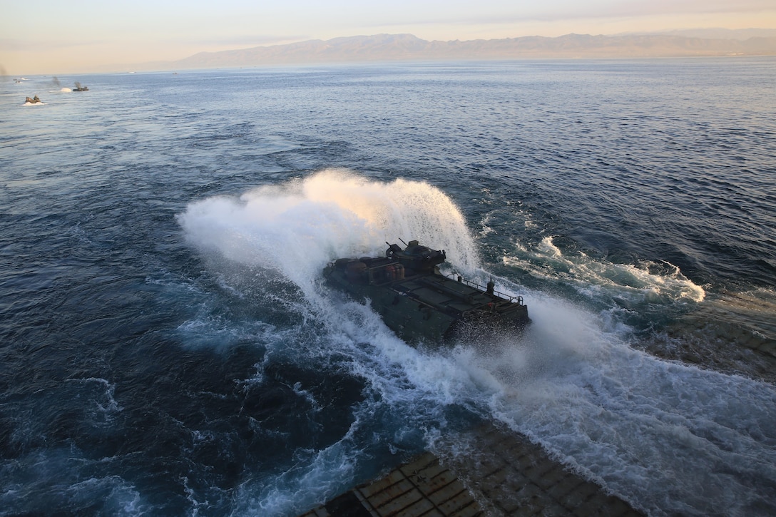 U.S. Marines with the 3rd Assault Amphibian Battalion, 1st Marine Division, depart the USS Rushmore to conduct an amphibious assault on Red Beach, Camp Pendleton, California, during Exercise Dawn Blitz, Oct. 27, 2017. DB17 is a scenario-driven amphibious exercise conducted between Expeditionary Strike Group 3 and 1st Marine Expeditionary Brigade, testing their ability to conduct amphibious operations in response to global crises and to project power ashore as part of a Navy-Marine Corps team.