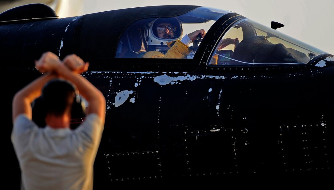 An Airman with the 99th Expeditionary Reconnaissance Squadron marshals Capt. Jon, a U-2 Dragon Lady pilot during his final flight with the 380th Air Expeditionary Wing at Al Dhafra Air Base, United Arab Emirates, Oct. 12, 2017. The U-2's are home based at the 9th Reconnaissance Wing, Beale Air Force Base, California, but are rotated to operational detachments worldwide. 
(U.S. Air Force photo by Tech. Sgt. Anthony Nelson Jr.)
