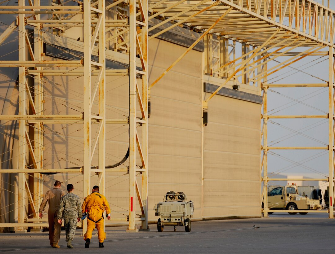 Capt. Jon, a U-2 Dragon Lady pilot walks off the flight line for the last time at Al Dhafra Air Base, United Arab Emirates, Oct. 12, 2017.  U-2's are routinely flown at altitudes over 70,000 feet, and  U-2 pilots must wear a full pressure suit similar to those worn by astronauts.
(U.S. Air Force photo by Tech. Sgt. Anthony Nelson Jr.)
