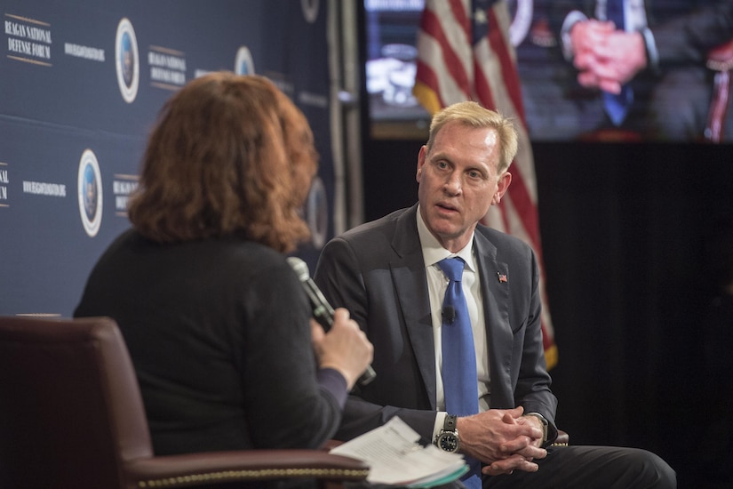 Deputy Defense Secretary Patrick M. Shanahan speaks with a reporter.