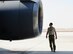 Chief Master Sgt. Scott Bishop, flight engineer conducts preflight scanning of a KC-10 Extender assigned to the 380th Air Expeditionary Wing, Al Dhafra Air Base, United Arab Emirates, Oct. 21, 2017.  The 380th generates multiple aircraft types providing combat missions in joint and combined aerospace operations with Army, Navy, Marine Corps & Coalition forces. (U.S. Air Force photo by Tech. Sgt. Anthony Nelson Jr.)