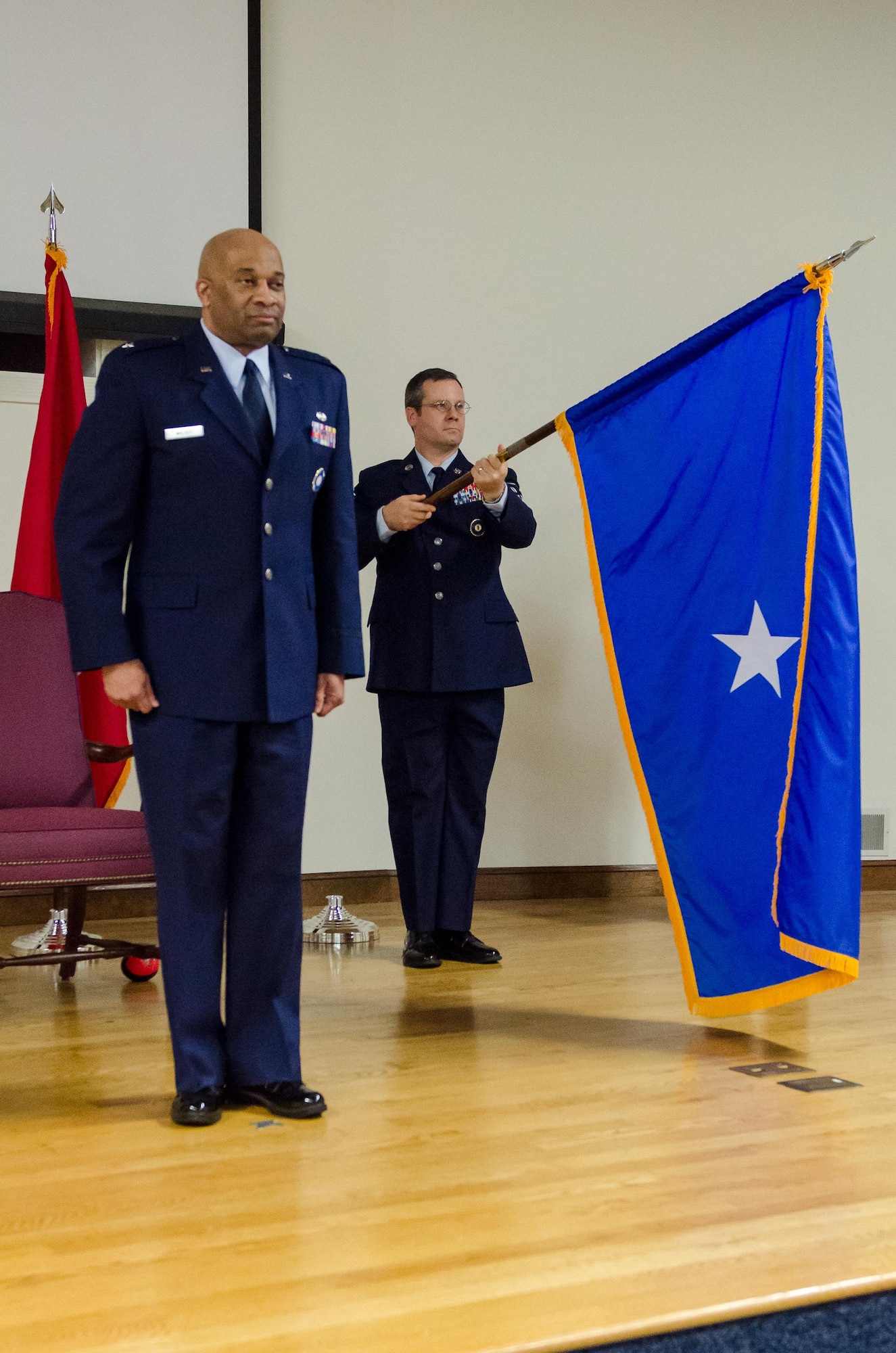 The flag for newly promoted Brig. Gen. Charles M. Walker, chief of staff for Headquarters, Kentucky Air National Guard, is unfurled for the first time during Walker’s promotion ceremony Nov. 4, 2017, at the Kentucky Air National Guard base, Louisville, Ky. (U.S. Air National Guard photo by Tech. Sgt. Vicky Spesard)