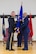 Army Maj. Gen. Steven R. Hogan (left), adjutant general of the Kentucky National Guard, presents the brigadier general flag to Charles M. Walker, chief of staff for Headquarters, Kentucky Air National Guard, during Walker’s promotion ceremony at the Kentucky Air National Guard base in Louisville, Ky., Nov. 4, 2017. (U.S. Air National Guard photo by Tech. Sgt. Vicky Spesard)