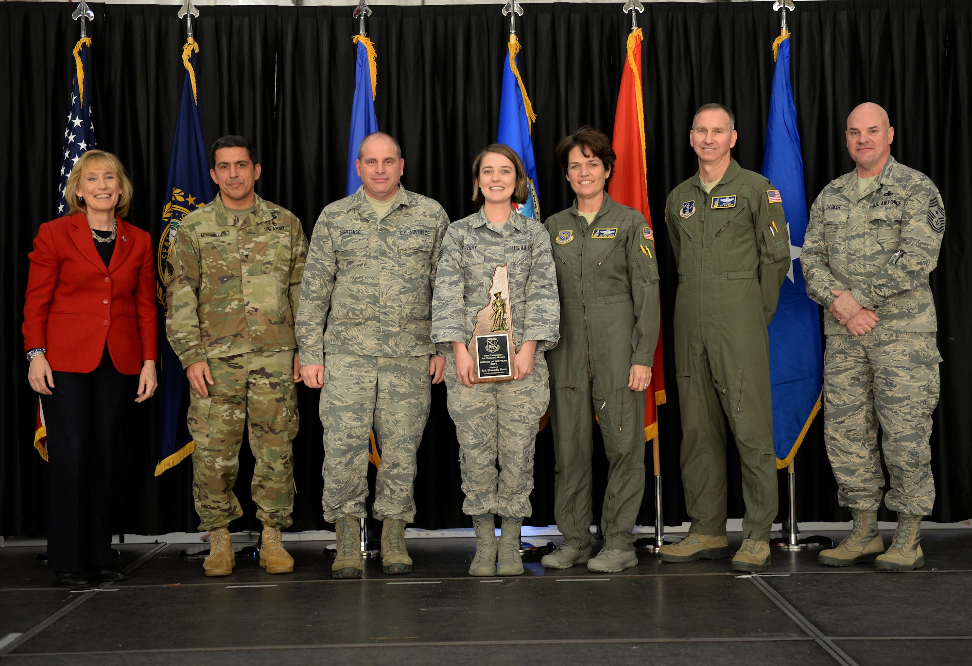 Staff Sgt. Shantelle Berry, assigned to the 157th Mission Support Group, poses with senior leaders of the N.H. National Guard and New Hampshire Sen. Maggie Hassan during the annual commander's call luncheon and awards ceremony on December 3, 2017, at Pease Air National Guard Base, N.H. Berry won the Airman of the Year award for 2017. (N.H. Air National Guard photo by Senior Airman Ashlyn Correia)