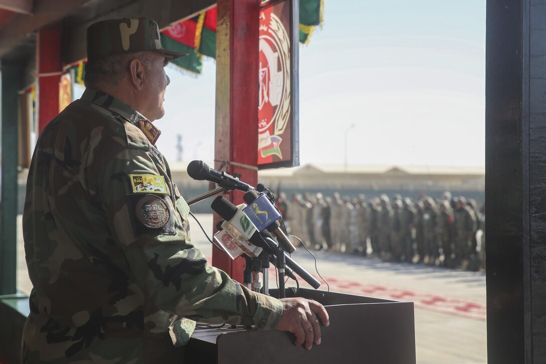 Afghan National Army Col. Shawali Zazai, the commanding officer of the Helmand Regional Military Training Center, speaks with ANA soldiers assigned to 6th Kandak, 1st Brigade, 215th Corps during a graduation ceremony at Camp Shorabak, Afghanistan, Dec. 3, 2017. The ceremony marked the end of the unit’s operational readiness cycle, an eight-week course led by Afghan instructors at the RMTC. Approximately 350 soldiers with the unit trained to enhance their infantry capabilities and will support Afghan National Defense and Security Force combat operations throughout the province. (U.S. Marine Corps photo by Lucas Hopkins)