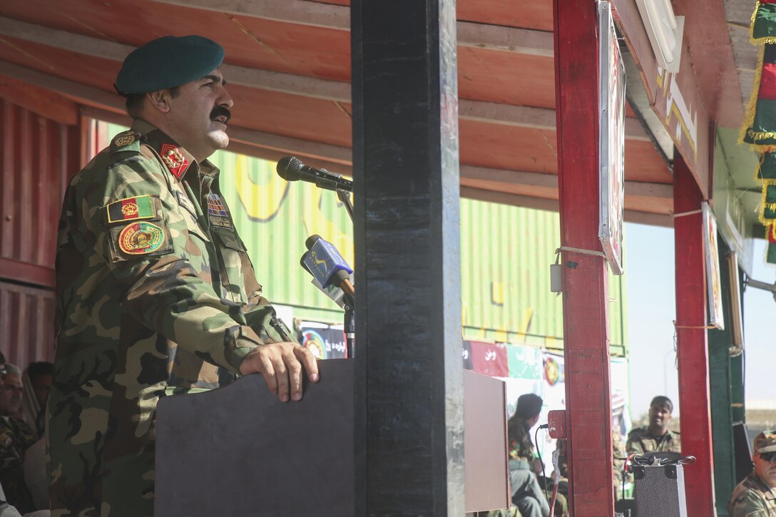 Afghan National Army Maj. Gen. Wali Mohammed Ahmadzai, the commanding general of 215th Corps, addresses Afghan National Army soldiers with 6th Kandak, 1st Brigade, 215th Corps during a graduation ceremony at Camp Shorabak, Afghanistan, Dec. 3, 2017. Hundreds of soldiers with the unit completed an operational readiness cycle at the Helmand Regional Military Training Center, which was led by Afghan instructors. Throughout the course, the soldiers of 6th Kandak, 1st Brigade worked to enhance their individual and collective infantry skills in preparation for future combat operations in the province. (U.S. Marine Corps photo by Sgt. Lucas Hopkins)