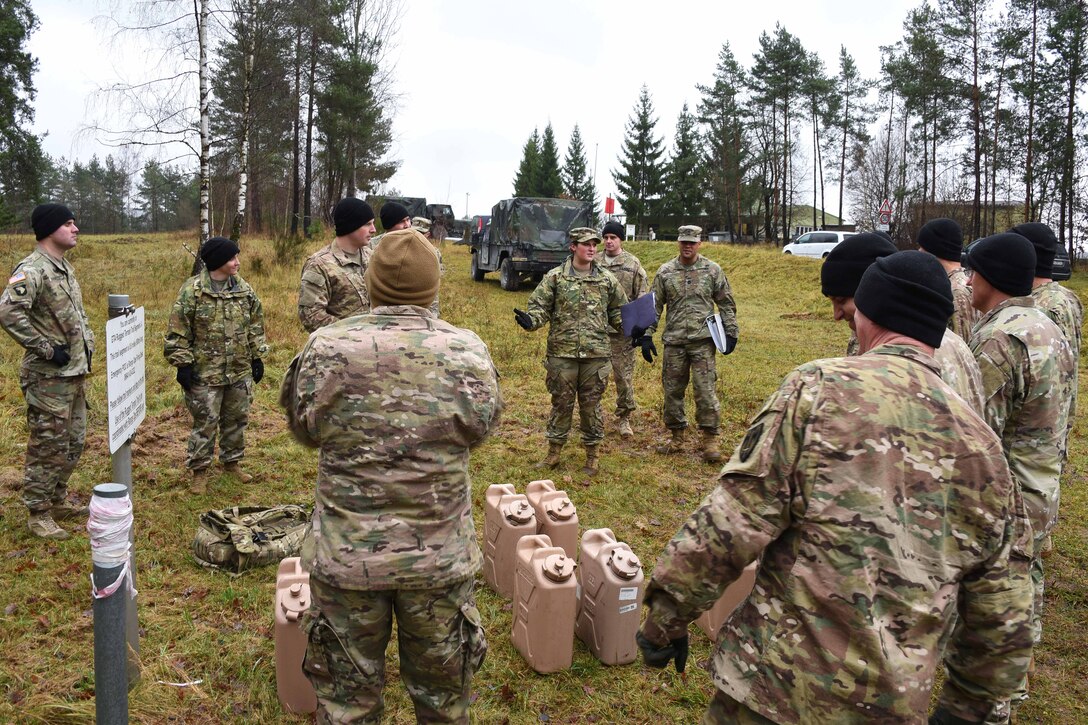 Soldiers receive a safety briefing before participating in the brigade’s first senior leader physical challenge.