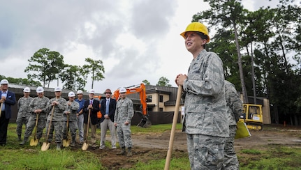 Lt. Col. Angela Waters, 39th Information Operations Squadron commander, addresses the assembled crowd during the Cyber Training Campus groundbreaking ceremony at Hurlburt Field, Fla., Aug. 10, 2017. Once completed in fiscal year 2018, the CTC will double the 39th IOS’ current capacity to produce operators for U.S. Cyber Command’s cyber mission force and Air Force cyber weapons systems