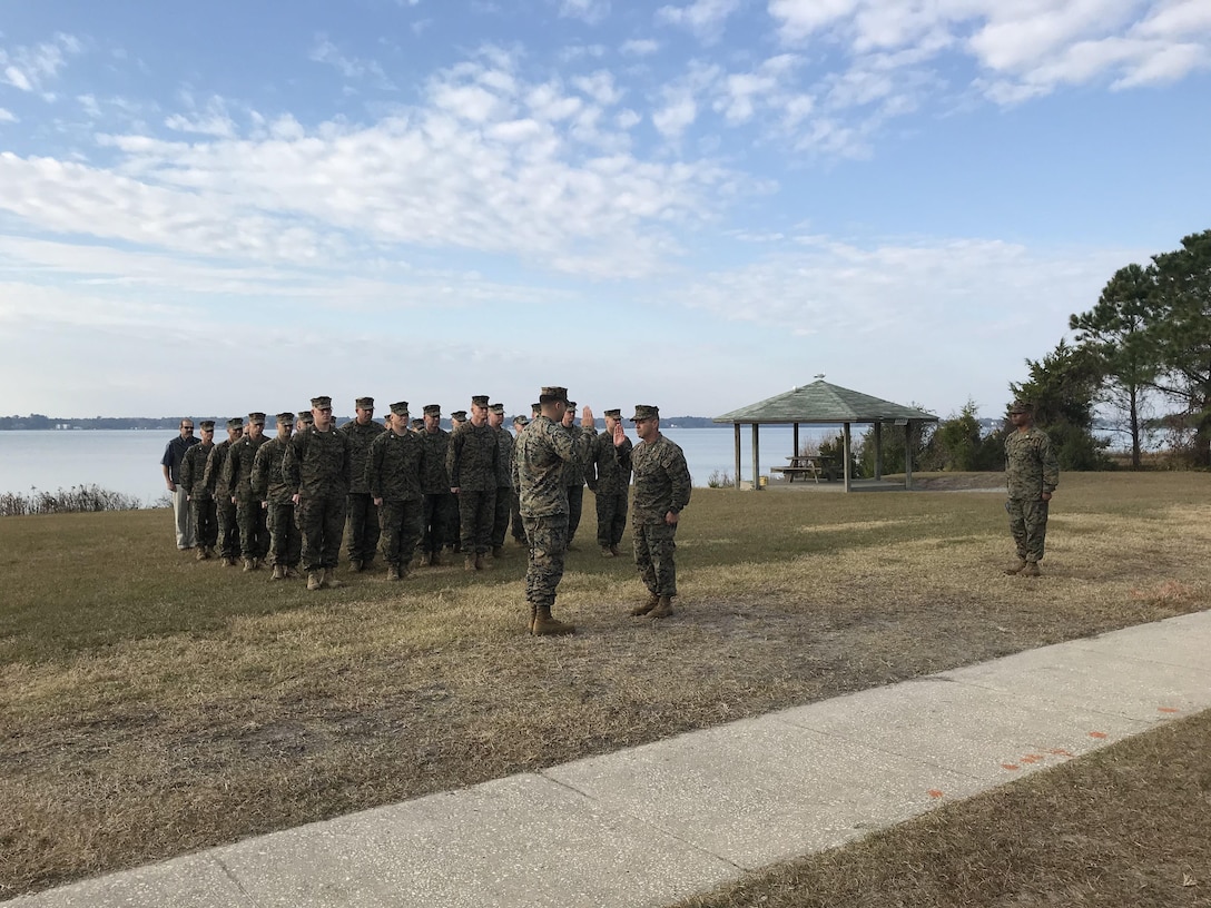 On December 1, 2017 First Lieutenant Charles Sieber was promoted to the rank of Captain behind BB-13 at Courthouse Bay, N. C. Colonel James H. Bain, Commanding Officer of Marine Corps Engineer School; administers the oath of office to newly promoted Captain Sieber in front of Marines, civilians, contractors, family, and friends.