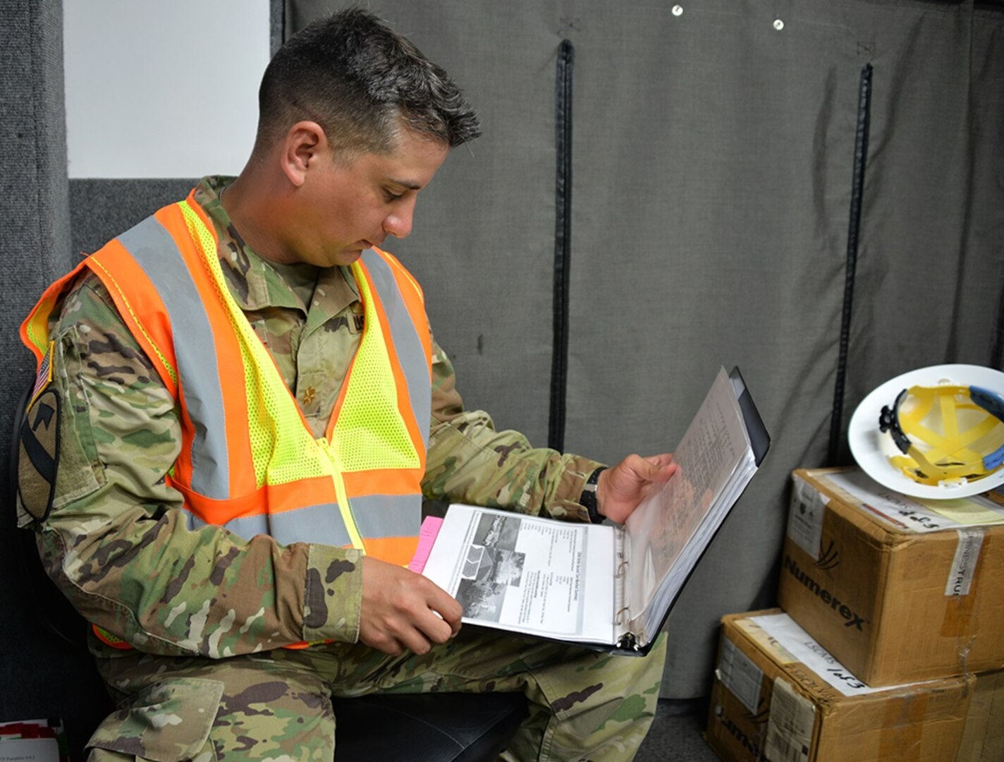 Maj. Eduardo Rodriquez coordinates the offload of power restoration equipment from USNS Brittin at the port of Ponce, Puerto Rico.