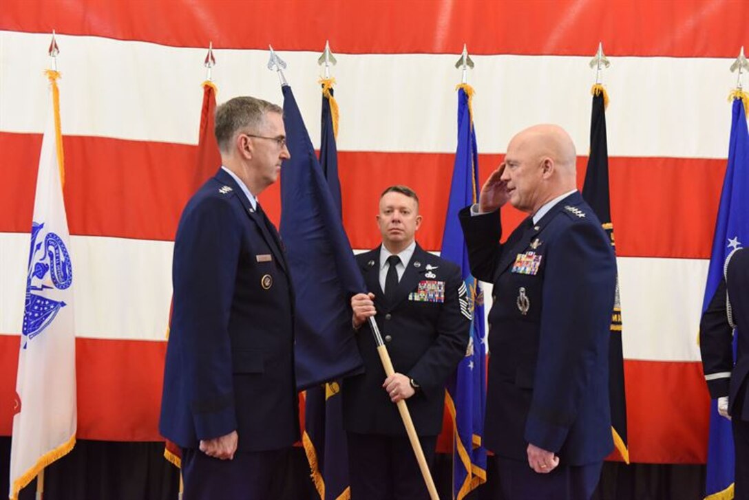 Air Force Gen. Jay Raymond, commander of Air Force Space Command, salutes Air Force Gen. John Hyten, commander of U.S. Strategic Command, during a ceremony at Vandenberg Air Force Base, Calif., Dec. 1, 2017. Raymond became the Joint Force Space Component commander taking operational responsibility for employment of all joint space forces.