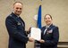 Col. Robert I. Kinney, Commander 188th Wing, presents Col. Misty M. Zelk, former commander of the 188th Medical Group with the Meritorious Service Medal at Fort Smith, AR., Dec. 02, 2017. (U.S. Air National Guard photo by Tech. Sgt. Daniel Condit)