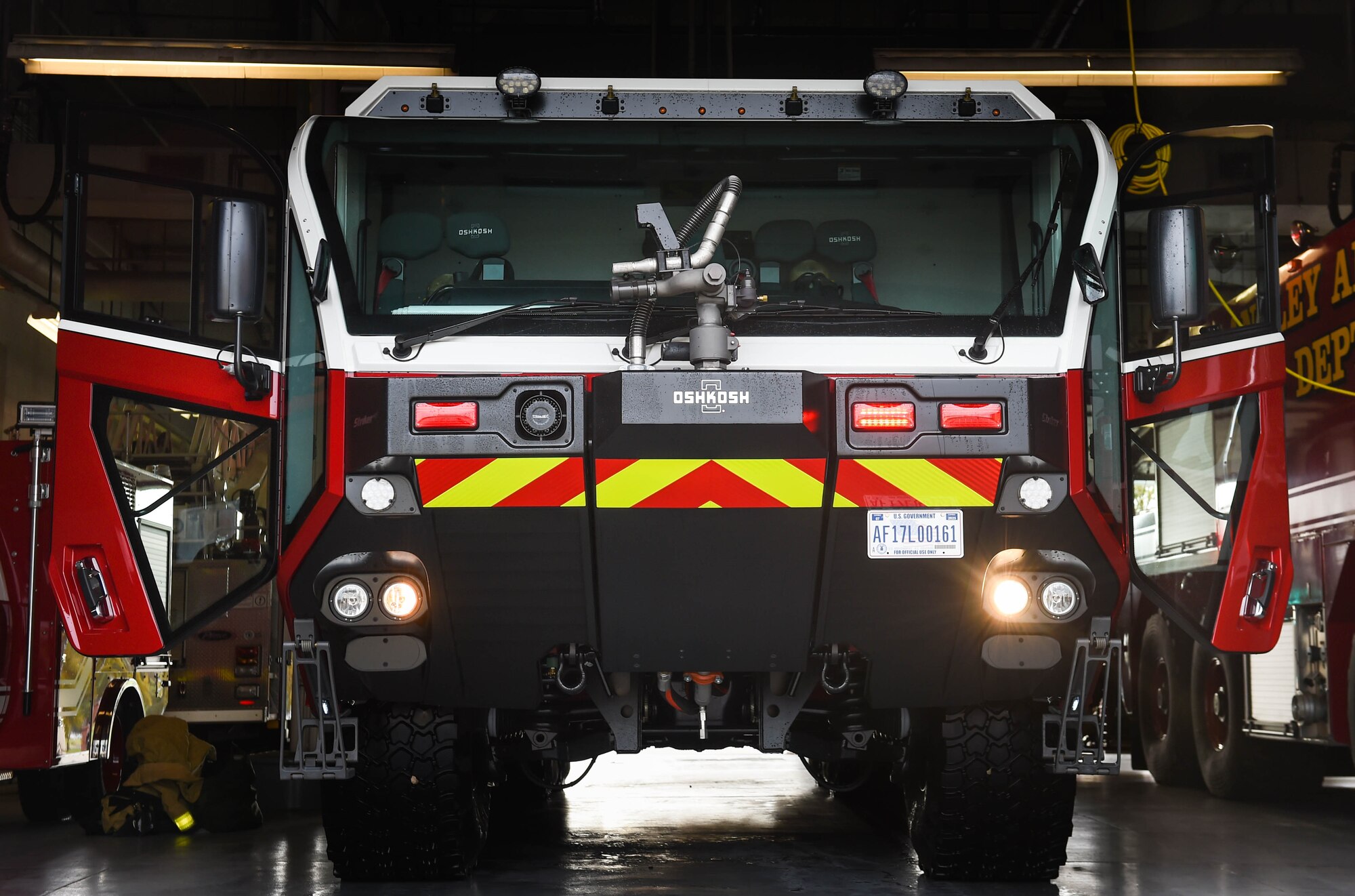 The 633rd Civil Engineer Squadron displays the new Striker 3000 at the Langley Fire Department on Joint Base Langley Eustis, Va., Nov. 22, 2017. The Striker has a high-pressured nozzle on the front that produces smaller water droplets allowing the water to absorb the heat of the fire faster and suppress it with less water.