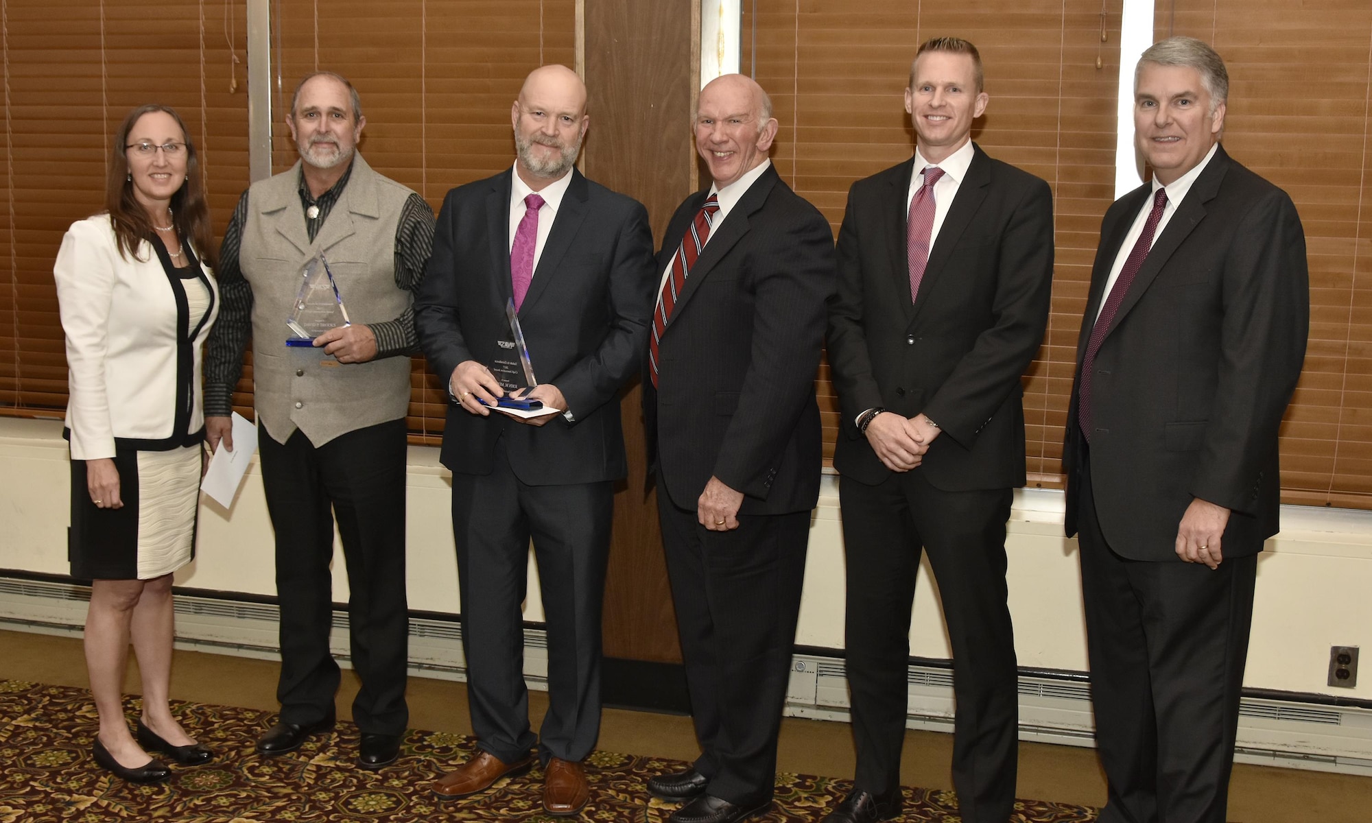David Brooks (second from left) and John Meeks (3rd from left), both NAS outside machinists, receive the Craft Innovation Award from NAS General Manager Cynthia Rivera during the National Aerospace Solutions 2017 Salute to Excellence Annual Awards Banquet held Nov. 16 at the Arnold Lakeside Center, Arnold AFB. Also pictured is NAS Deputy General Manager Doug Pearson, NAS Integrated Resources Director Ben Souther and NAS Test and Sustainment Engineering Manager Jeff Henderson. (U.S. Air Force photo/Rick Goodfriend)