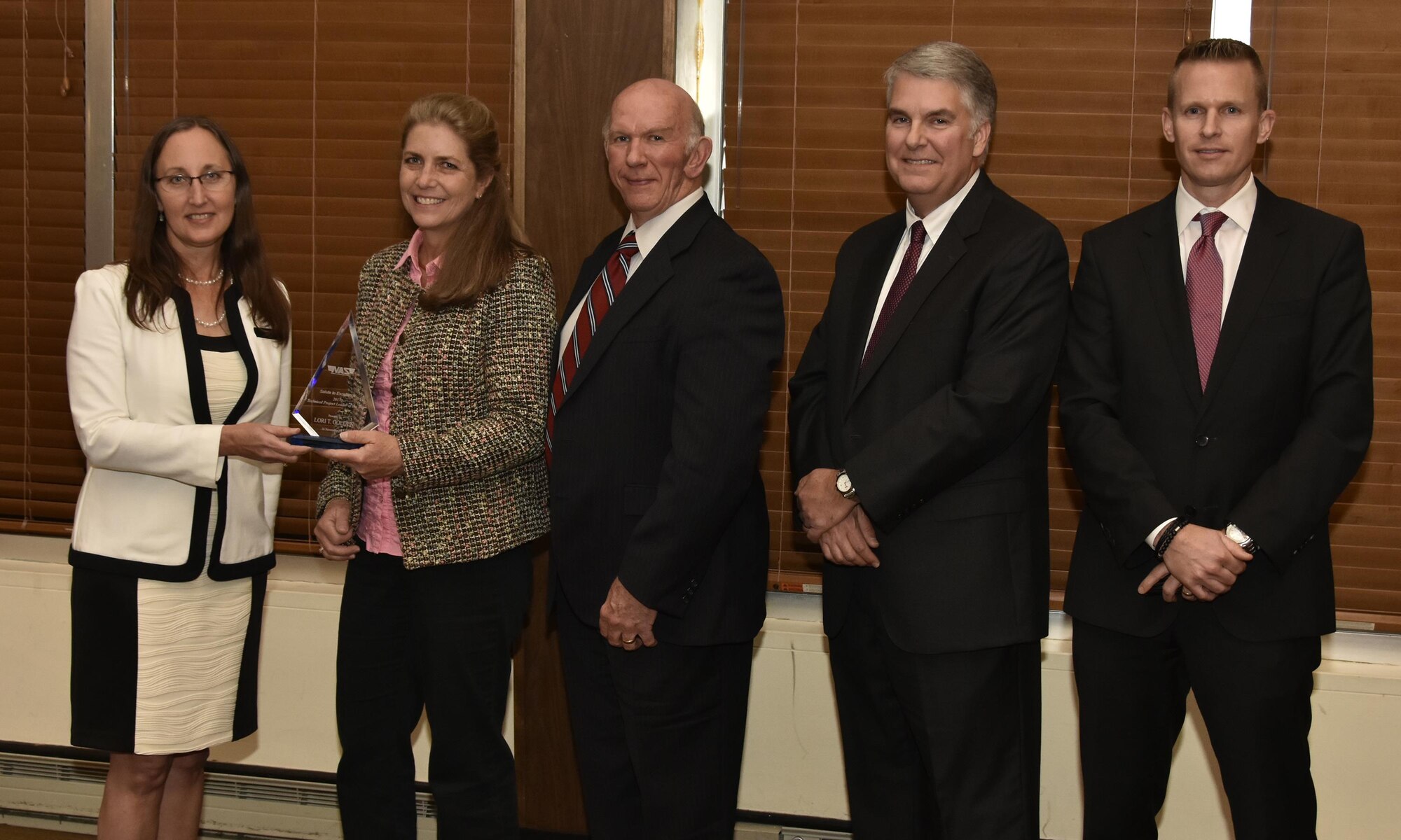 : Lori Golden (second from left), NAS Software technical project manager, receives the Technical Project Leader of the Year Award from NAS General Manager Cynthia Rivera during the National Aerospace Solutions 2017 Salute to Excellence Annual Awards Banquet held Nov. 16 at the Arnold Lakeside Center, Arnold AFB. Also pictured is NAS Deputy General Manager Doug Pearson, NAS Test and Sustainment Engineering Manager Jeff Henderson, and NAS Integrated Resources Director Ben Souther. (U.S. Air Force photo/Rick Goodfriend)