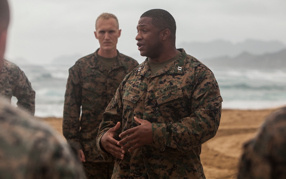 Capt. Marques Henderson, a communications officer with 3rd Radio Battalion, instructs U.S. Marines during a Martial Arts Instructors Course (MAIC) at Fort Hase Beach, Marine Corps Base Hawaii, Nov. 28, 2017. Marines must complete MAIC in order to become instructors in the Marine Corps Martial Arts Program, allowing them to train and test Marines to achieve a higher belt level. (U.S. Marine Corps photo by Lance Cpl. Tabanguil)