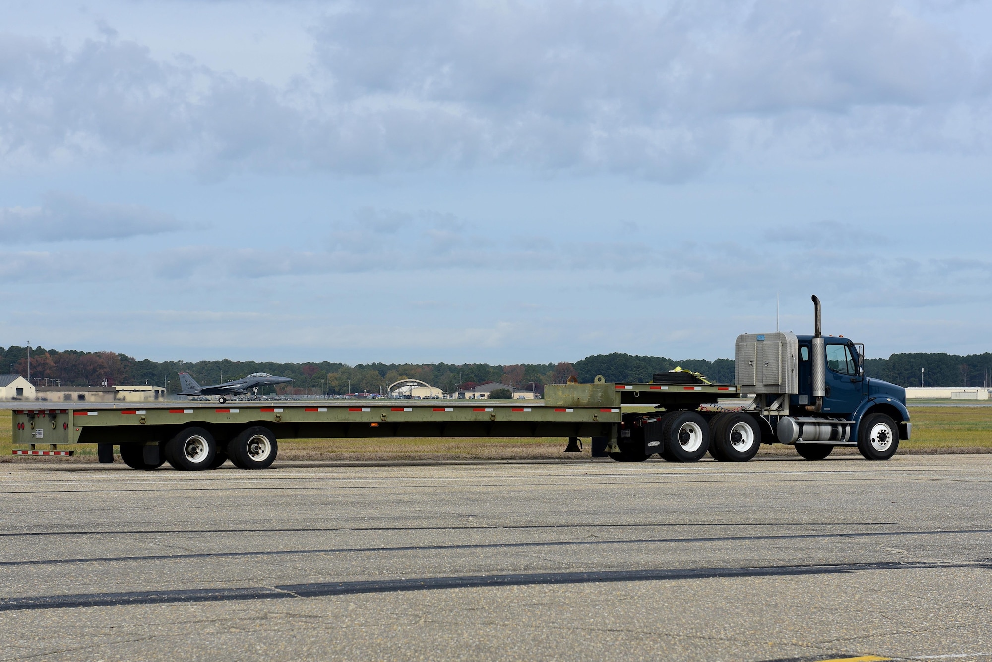 Airman Tre Graham, 4th Logistics Readiness Squadron vehicle operator, practices parking a tractor, Nov. 21, 2017, at Seymour Johnson Air Force Base, North Carolina. During the 336th Fighter Squadron’s deployment, October 2017, the 4th LRS ensured tractor trailers, buses and forklifts were ready for use. (U.S. Air Force photo by Airman 1st Class Kenneth Boyton)