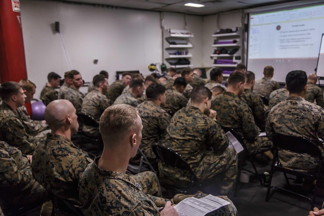 U.S. Marines with Fox Company, Battalion Landing Team, 2nd Battalion, 6th Marine Regiment, 26th Marine Expeditionary Unit (MEU), attend a career-oriented professional military education class aboard the dock landing ship USS Oak Hill (LSD 51) in the Atlantic Ocean, Nov. 30, 2017, during Combined Composite Training Unit Exercise (COMPTUEX) in the Atlantic Ocean, Nov. 30, 2017. Combined COMPTUEX allows all elements of the Marine Air Ground Task Force to join and train in realistic scenarios so the MEU as a whole can meet its Predeployment Training Program objectives prior to an upcoming deployment at sea. (U.S. Marine Corps photo by Staff Sgt. Dengrier M. Baez)