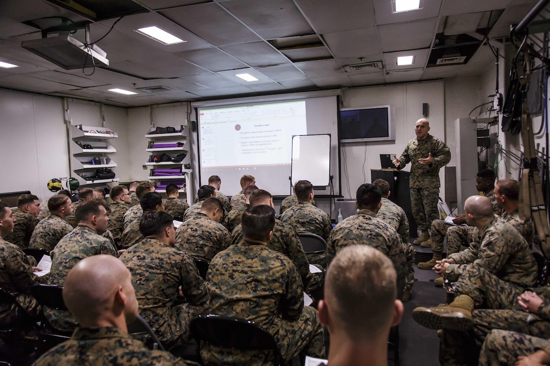 U.S. Marine Corps 1st Sgt. Christian Appleman, company first sergeant of Fox Company, Battalion Landing Team, 2nd Battalion, 6th Marine Regiment, 26th Marine Expeditionary Unit (MEU), and senior enlisted advisor of troops aboard the dock landing ship USS Oak Hill (LSD 51), leads a career-oriented professional military education class during Combined Composite Training Unit Exercise (COMPTUEX) in the Atlantic Ocean, Nov. 30, 2017. Combined COMPTUEX allows all elements of the Marine Air Ground Task Force to join and train in realistic scenarios so the MEU as a whole can meet its Predeployment Training Program objectives prior to an upcoming deployment at sea. (U.S. Marine Corps photo by Staff Sgt. Dengrier M. Baez)