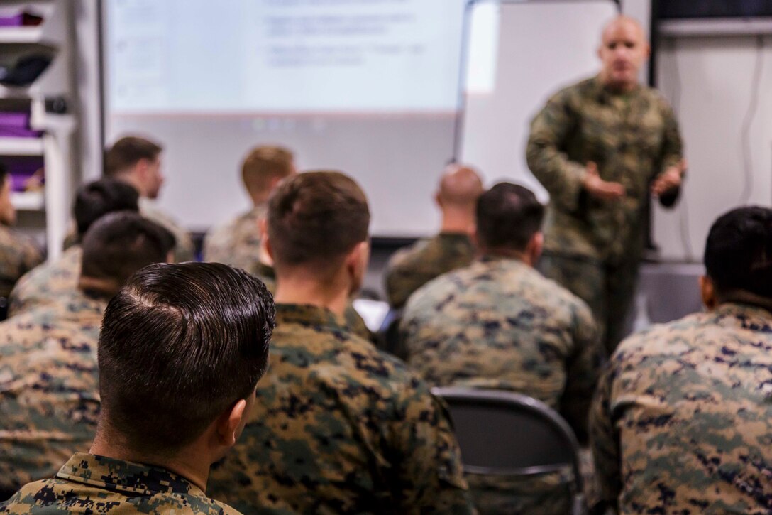 U.S. Marine Corps 1st Sgt. Christian Appleman, company first sergeant of Fox Company, Battalion Landing Team, 2nd Battalion, 6th Marine Regiment, 26th Marine Expeditionary Unit (MEU), and senior enlisted advisor of troops aboard the dock landing ship USS Oak Hill (LSD 51), leads a career-oriented professional military education class during Combined Composite Training Unit Exercise (COMPTUEX) in the Atlantic Ocean, Nov. 30, 2017. Combined COMPTUEX allows all elements of the Marine Air Ground Task Force to join and train in realistic scenarios so the MEU as a whole can meet its Predeployment Training Program objectives prior to an upcoming deployment at sea. (U.S. Marine Corps photo by Staff Sgt. Dengrier M. Baez)