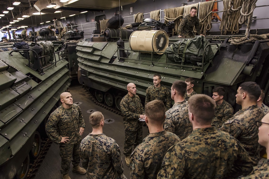 U.S. Marines and Sailors with Fox Company, Battalion Landing Team, 2nd Battalion, 6th Marine Regiment, 26th Marine Expeditionary Unit (MEU), conduct a call away, an accountability and boarding procedures rehearsal, at the well deck of the dock landing ship USS Oak Hill (LSD 51) in Atlantic Ocean Nov. 28, 2017, as part of Combined Composite Training Unit Exercise (COMPTUEX). Combined COMPTUEX allows all elements of the Marine Air Ground Task Force to join and train in realistic scenarios so the MEU as a whole can meet its Predeployment Training Program objectives prior to an upcoming deployment at sea. (U.S. Marine Corps photo by Staff Sgt. Dengrier M. Baez)