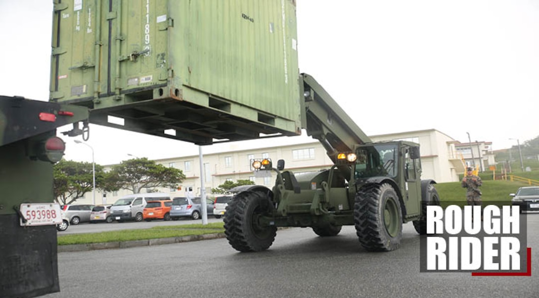 Lance Cpl. Teddy Atkinson, a heavy equipment operator with Supply Company, 3rd Transportation Support Battalion, Combat Logistics Regiment 3, uses hand-and-arm signals to direct an extendable boom forklift moving a shipping container Dec. 4, 2017 at Camp Foster, Okinawa, Japan.CLR-3 recently completed a rotation with Korean Marine Exchange Program 18.1 in Camp Mujuk, Pohang, South Korea. Atkinson is a native of Sacramento, California. (U.S. Marine Corps photo by Sgt. Tiffany Edwards)