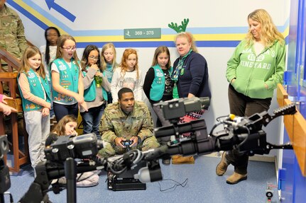 Army Reserve Soldiers help Girl Scouts learn about robots