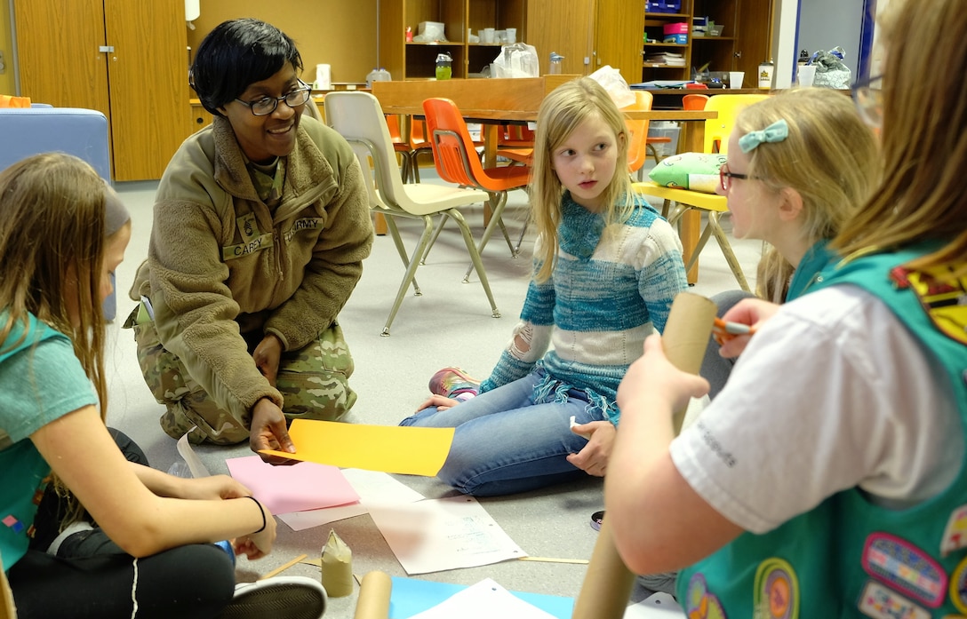 Army Reserve Soldiers help Girl Scouts learn about robots