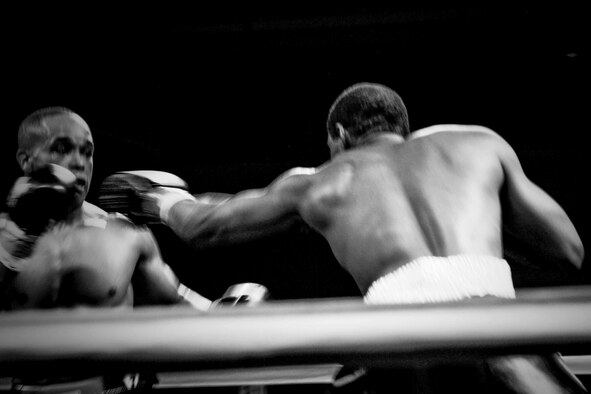 U.S. Air Force Tech. Sgt. Andre Penn, 20th Civil Engineer Squadron unaccompanied housing manager, dodges a punch during a boxing match at the “Battle in the Panhandle,” in Fort Walton Beach, Florida, Nov. 18, 2017.