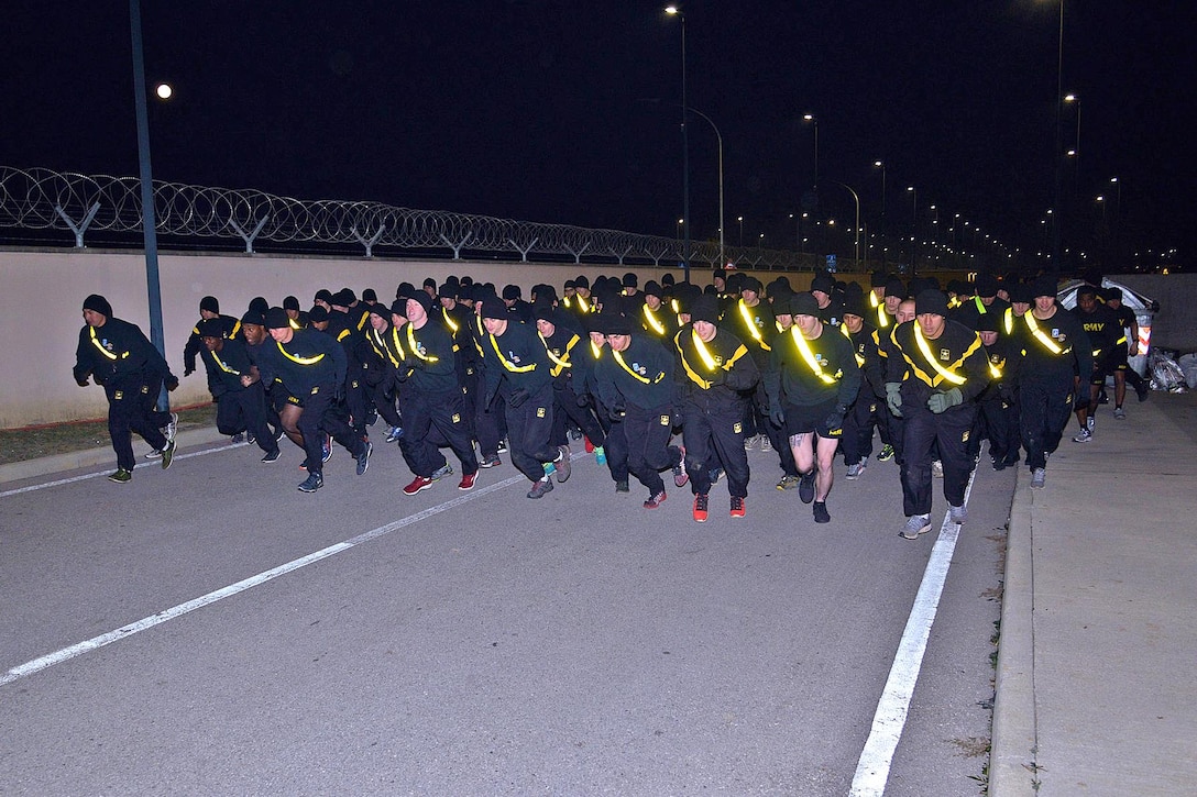 Soldiers participate in the running event during physical training.