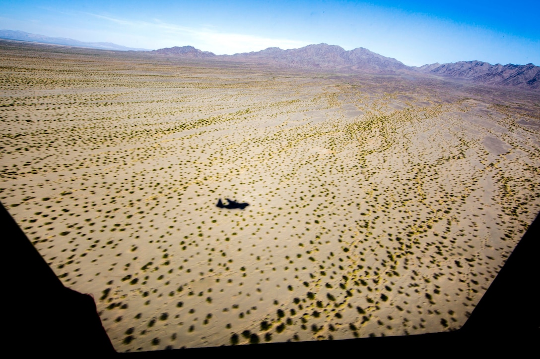 A Marine Corps KC130-J Hercules aircraft conducts tactical navigation during unit-level tactical navigation training.