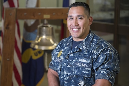 Petty Officer First Class Christopher Thomas, Navy Recruiting District San Antonio recruiter, poses for a portrait Oct. 25, 2017.  Thomas’ mission is to find officer applicants to lead naval forces in conducting operations on land, air and sea.  (U.S. Air Force photo by Sean M. Worrell)