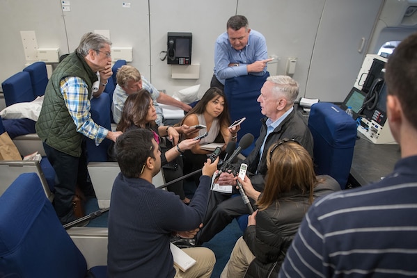 Defense Secretary James N. Mattis speaks with the media during a flight to Kuwait from Aqaba, Joran, Dec. 3, 2017. (DoD photo by Army Sgt. Amber I. Smith)