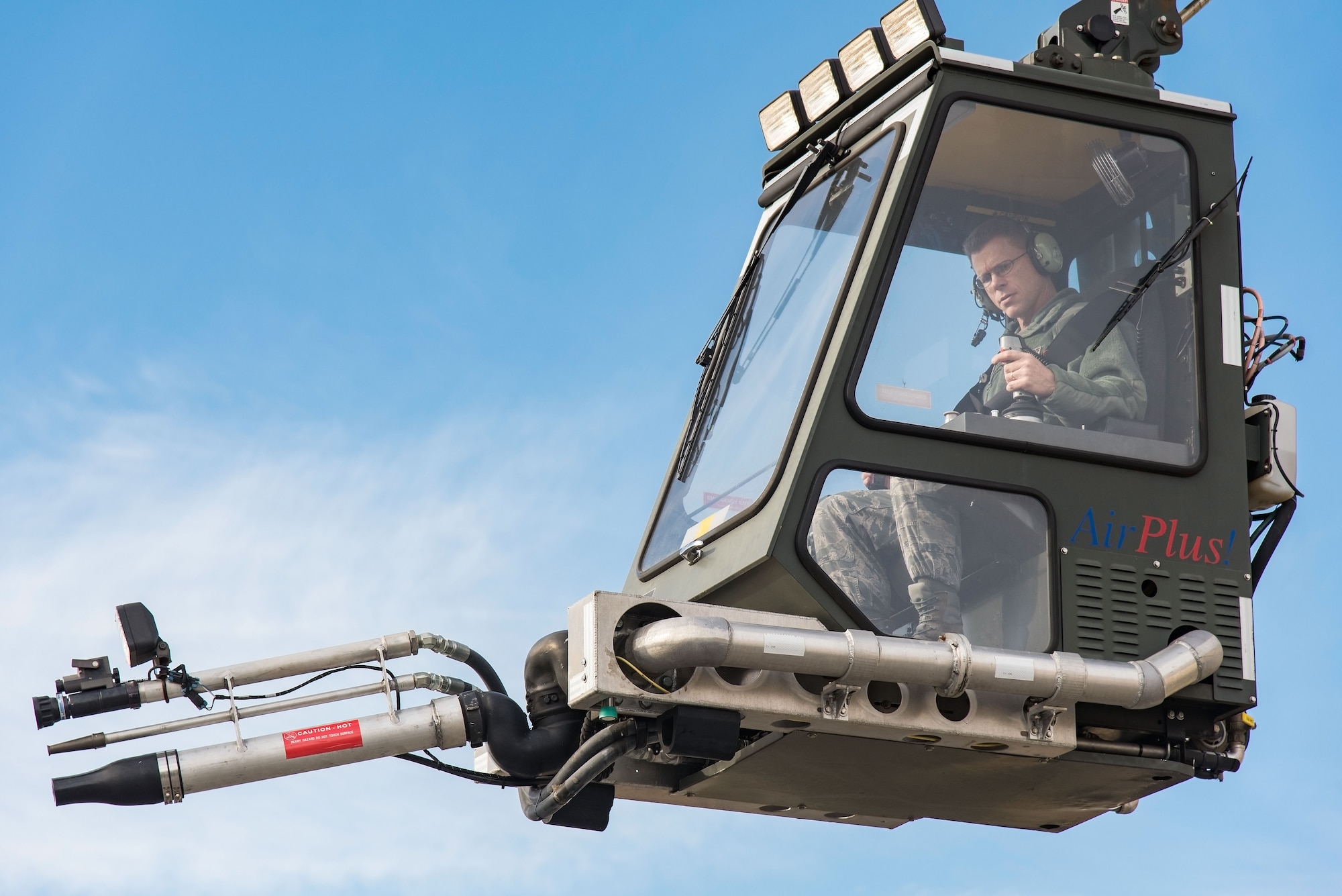 Brig. Gen. Steven Bleymaier, Director of Logistics, Engineering and Force Protection, Headquarters Air Mobility Command, Scott Air Force Base, Ill., steers a GL2875 High Reach Deicer during a test ride Nov. 30, 2017, on Dover Air Force Base, Del. Bleymaier visited 436th Logistics Readiness Squadron personnel assigned to the Heavy Equipment Vehicle Maintenance section. (U.S. Air Force photo by Roland Balik)