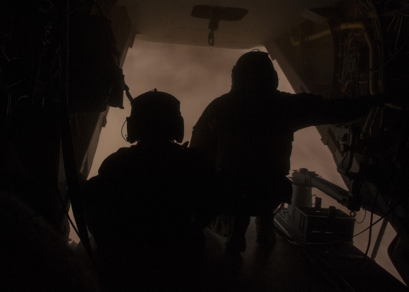 U.S. Air Force Chief Master Sgt. Juliet Gudgel, command chief master sergeant of Air Education and Training Command, performs lift operations during a training mission in a CV-22 Osprey at Kirtland Air Force Base, N.M., Nov. 27, 2017. The training sortie was Gudgel's first flight in a CV-22 and operating a lift. (U.S. Air Force photo by Staff Sgt. J.D. Strong II)