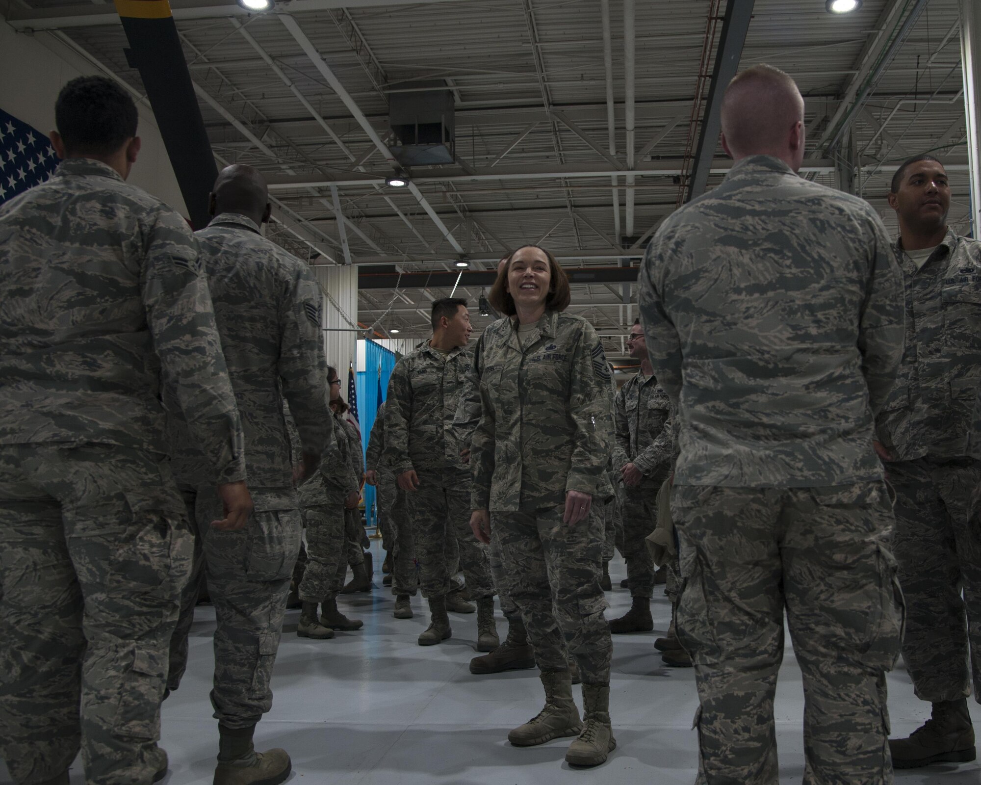 U.S. Air Force Chief Master Sgt. Juliet Gudgel, command chief master sergeant of Air Education and Training Command, laughs while speaking with Airmen from the 58th Special Operations Wing, at Kirtland Air Force Base, N.M., Nov. 27, 2017. Gudgel visited the installation for two days to speak with the Airmen and gain a better understanding of what they do to support the 58th SOW, AETC and Air Force Special Operations Command. (U.S. Air Force photo by Staff Sgt. J.D. Strong II)