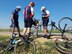 Members of the Air Force Cycling Team help change a flat tire during the Register's Annual Great Bike Ride Across Iowa near Spencer, Iowa, July 24. The AFCT works to promote the Air Force by interacting with the American public at cycling events across the United States. (Courtesy Photo)
