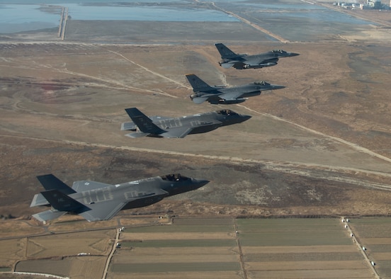 F-35A Lightning II aircraft from Hill Air Force Base, Utah, fly in formation with F-16 Fighting Falcon aircraft assigned to the 8th Fighter Wing in the skies over South Korea.