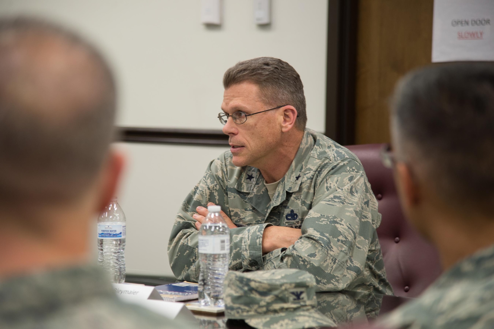 Brig. Gen. Steven Bleymaier, Director of Logistics, Engineering and Force Protection, Headquarters Air Mobility Command, takes questions from unit commanders during a tour Nov. 29, 2017, at Dover Air Force Base, Del.