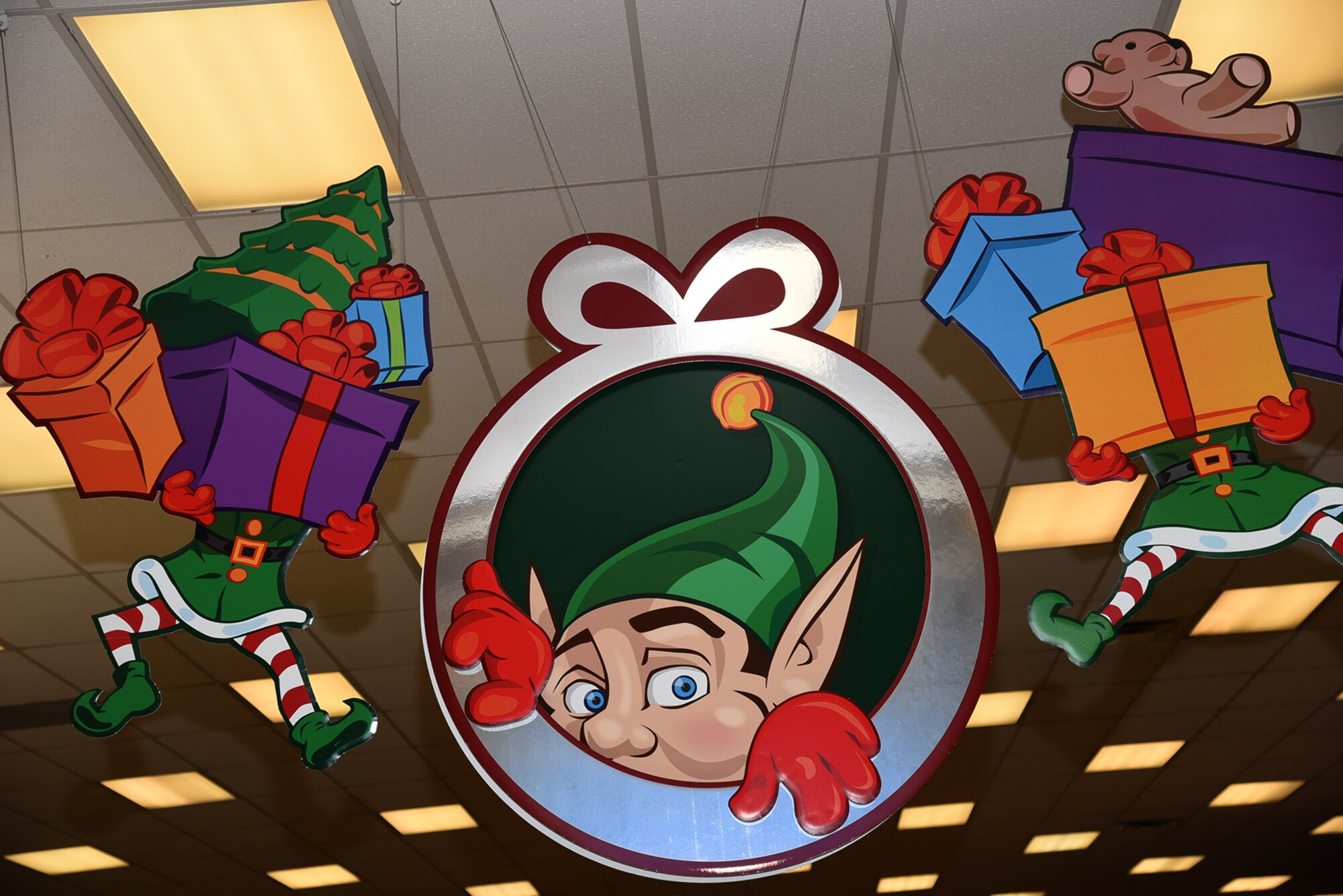 PETERSON AIR FORCE BASE, Colo. – Cardboard Christmas elves hang from the ceiling at the Base Exchange on Peterson Air Force Base, Colorado, Dec. 5, 2017. Christmas is traditionally a time when friends and families come together to celebrate the holiday season. (U.S. Air Force photo by Robb Lingley)