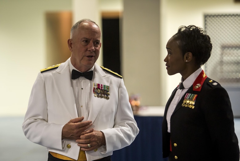 Rear Adm. Brent Scott, the Chaplain of the Marine Corps, meets with Lt. Col. Marshalee Clarke, commanding officer for Headquarters Battalion, Marine Corps Base Hawaii, during the Navy Chaplain Corps’ 242nd anniversary celebration, Joint Base Pearl Harbor-Hickam, Dec. 2, 2014. The event featured Scott as the guest speaker, and celebrated the Chaplain Corps’ storied history with dinner, music, and traditional Hawaiian dance performances. The celebration also highlighted the important role chaplains play in the emotional and spiritual resiliency of Marines, both forward deployed and in garrison. (U.S. Marine Corps photo by Lance Cpl. Luke Kuennen)