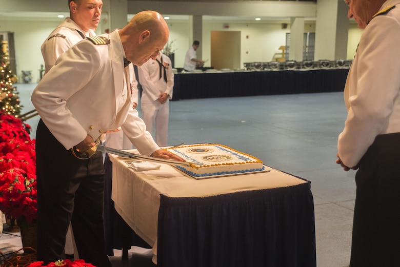 U.S. Navy Capt. Stephen Lee cuts the ceremonial birthday cake during the Chaplain Corps’ 242nd anniversary celebration, Joint Base Pearl Harbor-Hickam, Dec. 2, 2014. The event featured Rear Adm. Brent Scott, the Chaplain of the Marine Corps, as the guest speaker, and celebrated the Chaplain Corps’ storied history with dinner, music, and traditional Hawaiian dance performances. The celebration also highlighted the important role chaplains play in the emotional and spiritual resiliency of Marines, both forward deployed and in garrison. (U.S. Marine Corps photo by Lance Cpl. Luke Kuennen)