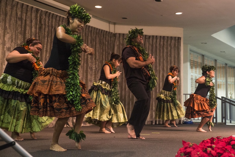 Members of “Dancing for His Glory” group perform a hula dance during the U.S. Navy Chaplain Corps’ 242nd anniversary celebration, Joint Base Pearl Harbor-Hickam, Dec. 2, 2014. The event featured Rear Adm. Brent Scott, the Chaplain of the Marine Corps, as the guest speaker, and celebrated the Chaplain Corps’ storied history with dinner, music, and traditional Hawaiian dance performances. The celebration also highlighted the important role chaplains play in the emotional and spiritual resiliency of Marines, both forward deployed and in garrison. (U.S. Marine Corps photo by Lance Cpl. Luke Kuennen)