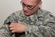 U.S. Air Force Reserve Senior Airman Hector Rodriguez, an engine mechanic assigned to the 913th Maintenance Squadron, applies a tourniquet to himself during Self-Aid Buddy Care (SABC) Hands-On training Dec. 2, 2017, at Little Rock Air Force Base, Ark.