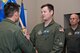 U.S. Air Force Reserve Col. Christopher T. Lay, commander, 913th Airlift Group, passes the guidon to Lt. Col. Daniel Collister during a change of command ceremony for the 327th Airlift Squadron at Little Rock Air Force Base, Ark., Dec. 2, 2017.
