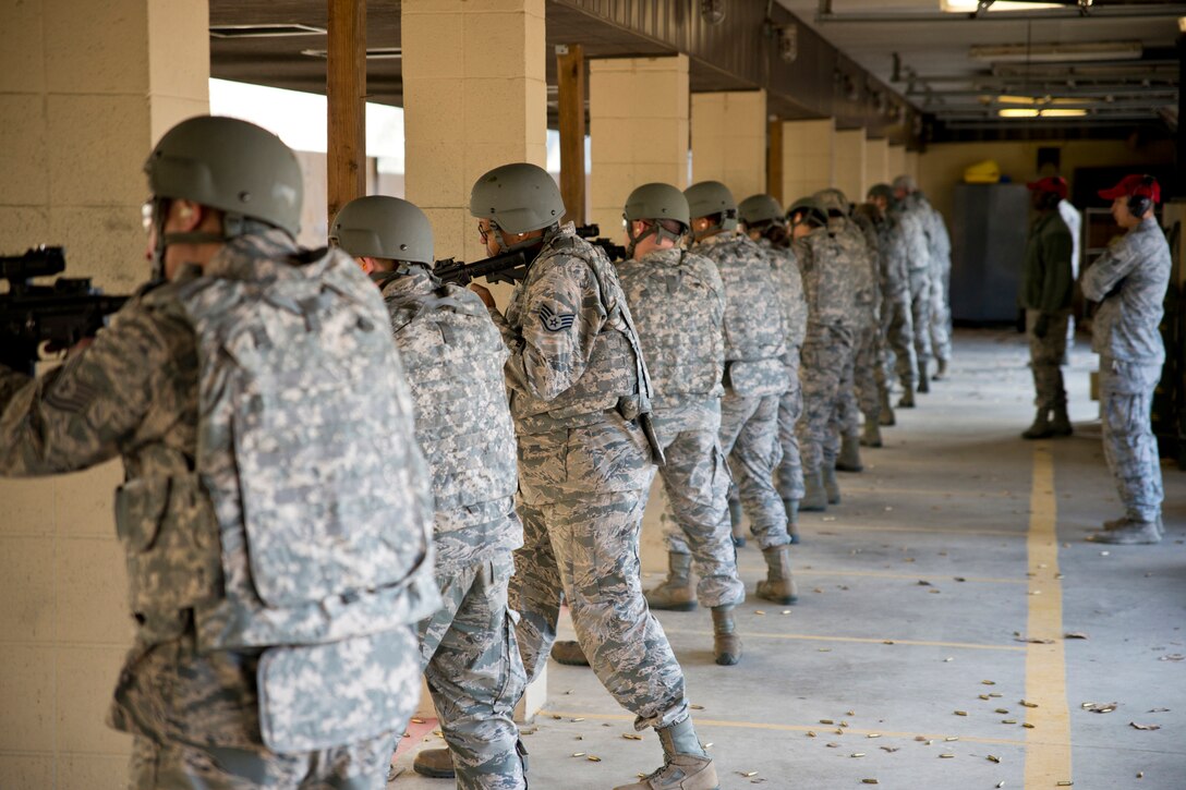 U.S. Air Force Reserve Airmen assigned to the 96th Aerial Port Squadron fire at the targets with the M4 rifle at the shooting range on Little Rock Air Force Base, Ark., Dec. 2, 2017.